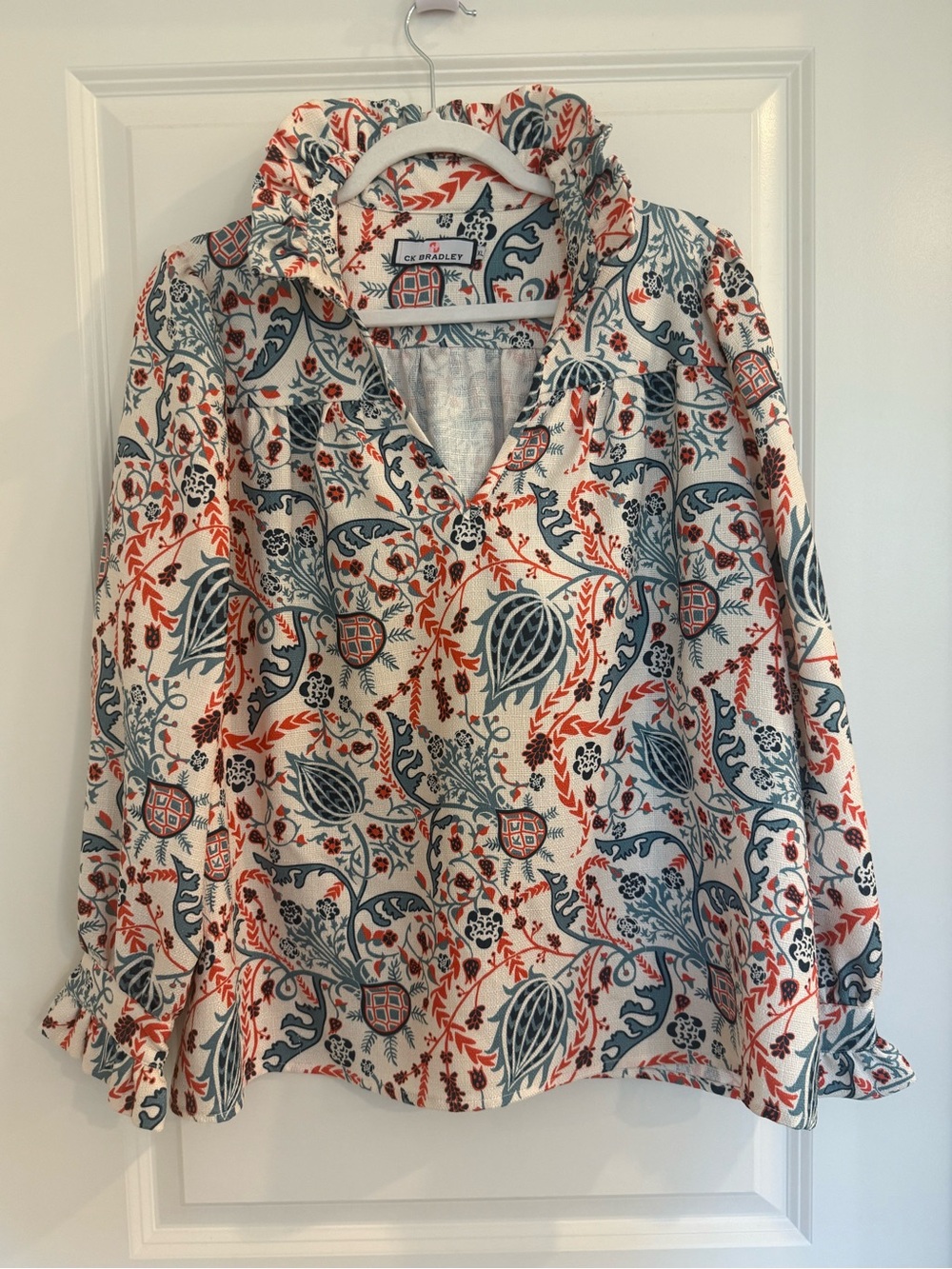 Ck Bradley Floral Ruffle V-Neck Long Sleeve Blouse in Coral and Teal